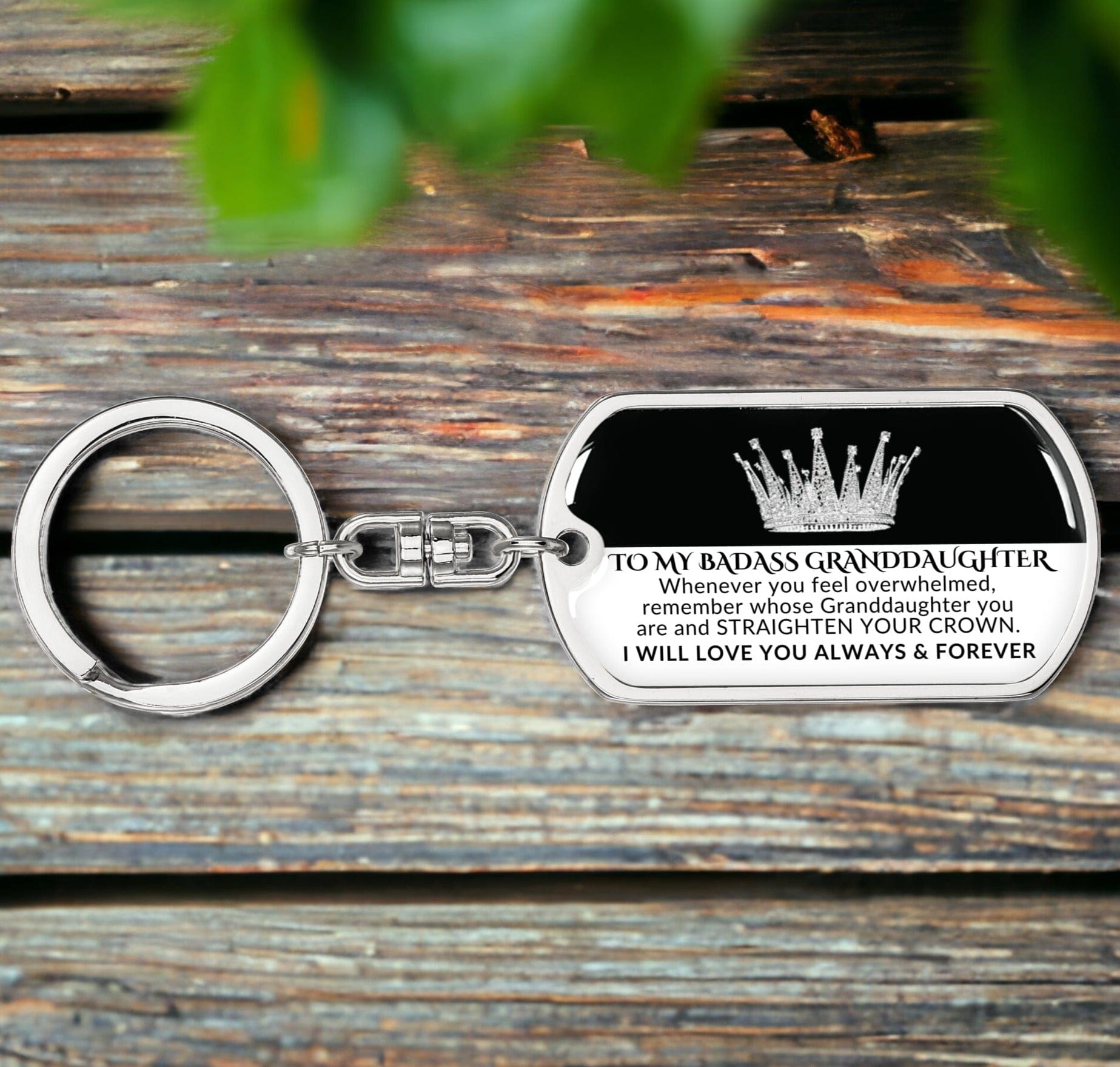 Gift for granddaughter Swivel dog tag keychain with the inscription "TO MY BADASS GRANDDAUGHTER Whenever you feel overwhelmed, remember whose Granddaughter you are and STRAIGHTEN YOUR CROWN. I will love you always & forever," exclusive to Design It Personal