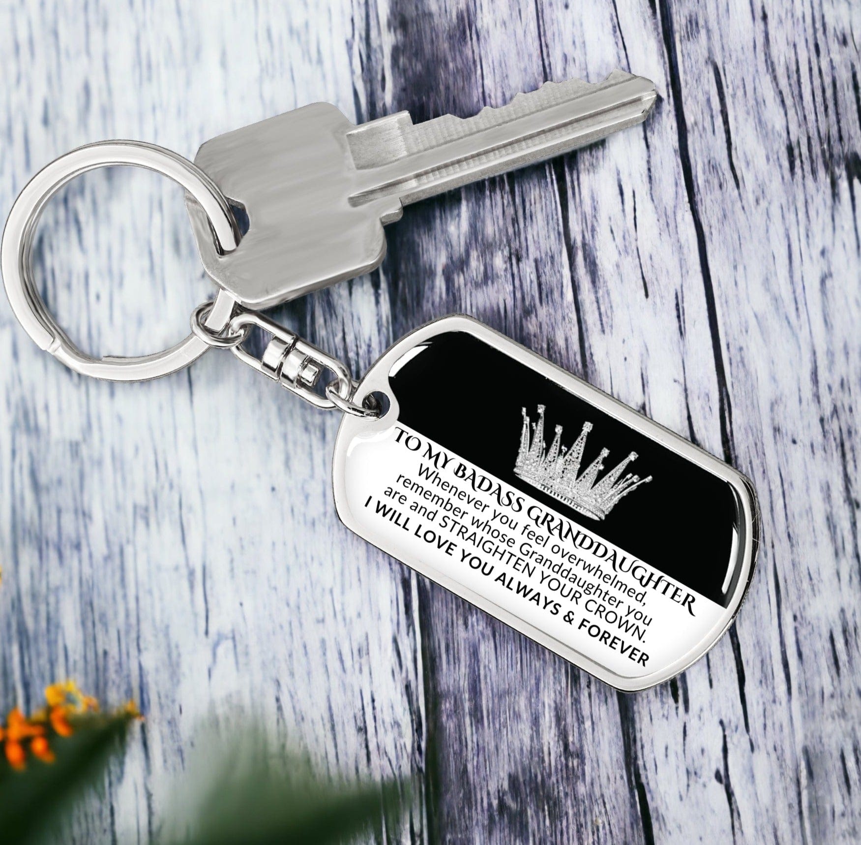 Gift for granddaughter Swivel dog tag keychain with the inscription "TO MY BADASS GRANDDAUGHTER Whenever you feel overwhelmed, remember whose Granddaughter you are and STRAIGHTEN YOUR CROWN. I will love you always & forever," exclusive to Design It Personal