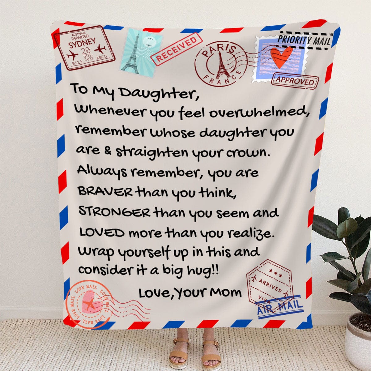 Message blanket to daughter from mom to remind her show strong she is and that her mother loves her. And to wrap herself in the blankt when she needs a hug from the mom if the mom isn't there.