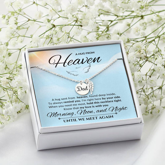 An elegant memorial necklace for dad, featuring angel wings and a pendant with a heartfelt poem. The pendant is displayed against a soft background, symbolizing eternal love and remembrance.