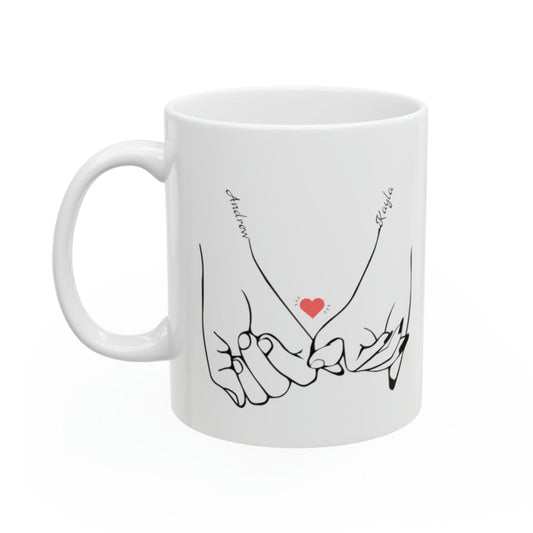 Line art drawing graphic  of hands holding pinkies with the couple's names added to personalize the coffee mug